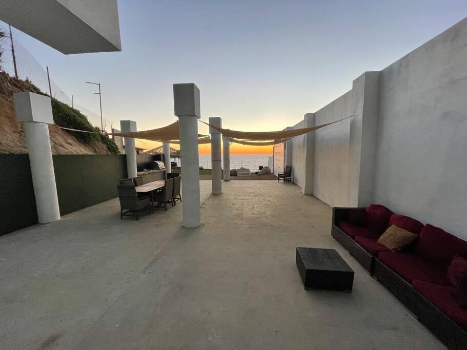 Triton'S Playhouse Beachfront Primo Tapia Exterior photo